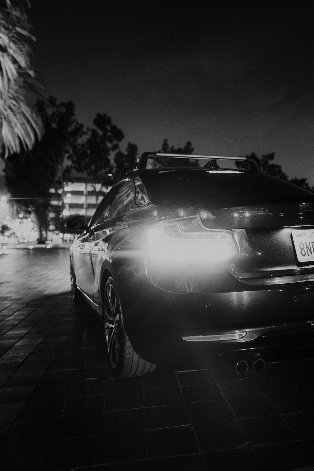 a black and white photo of a car