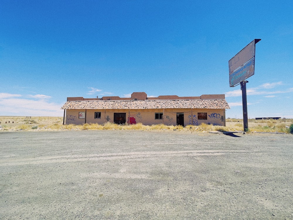 an old building with a sign in front of it