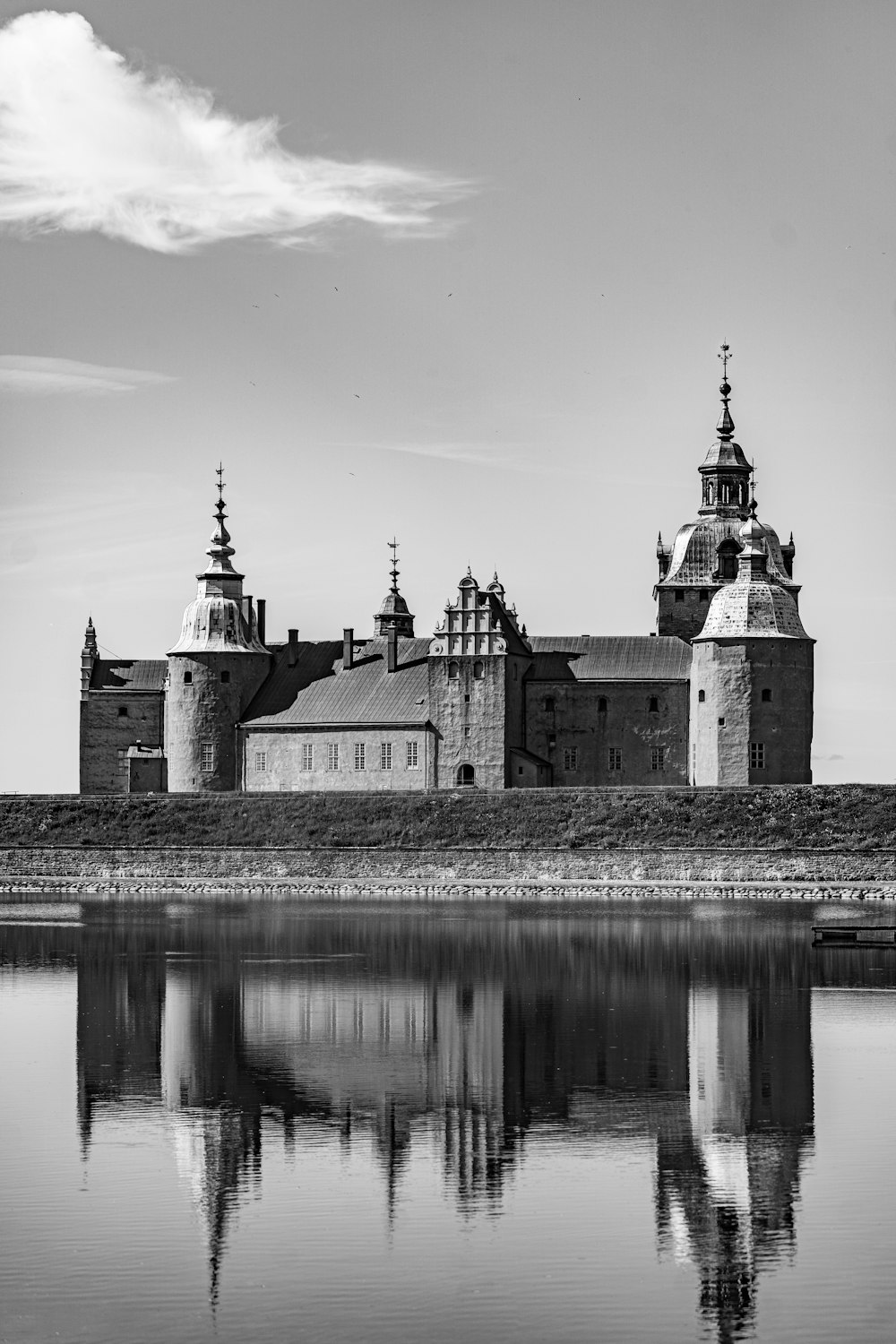 a black and white photo of a castle