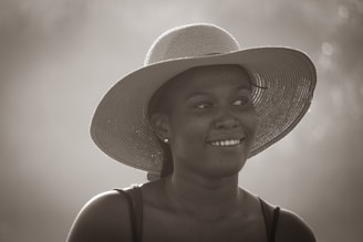 woman in brown sun hat