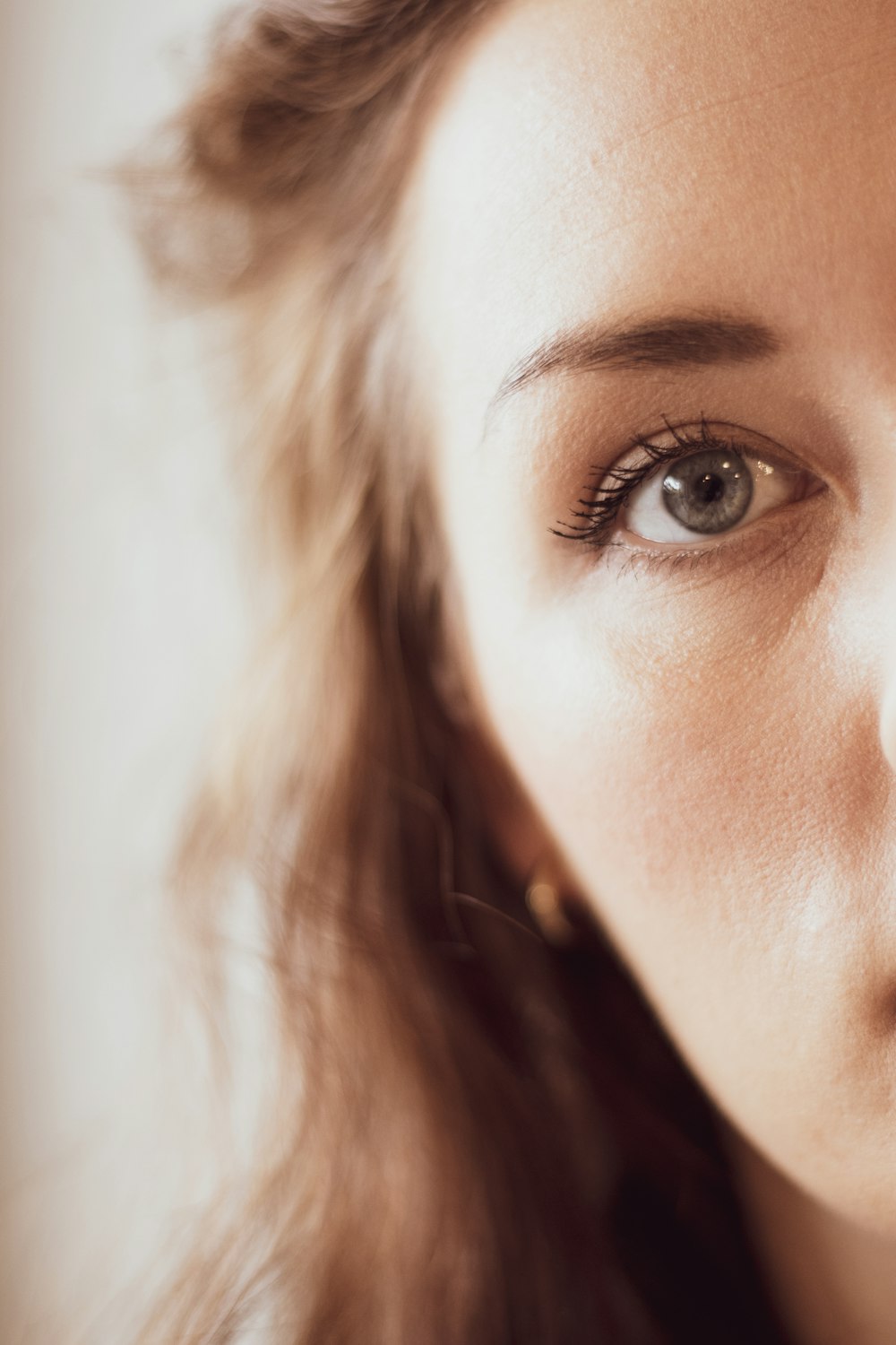 a close up of a woman with long hair