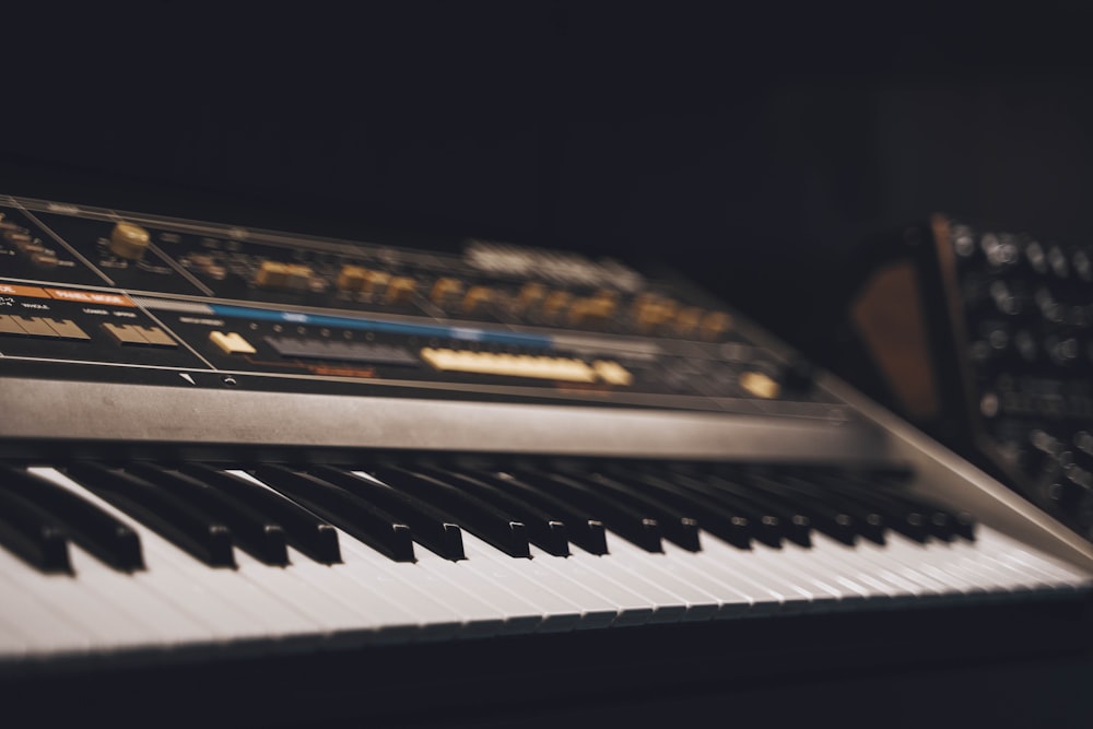 a close up of a keyboard with many keys