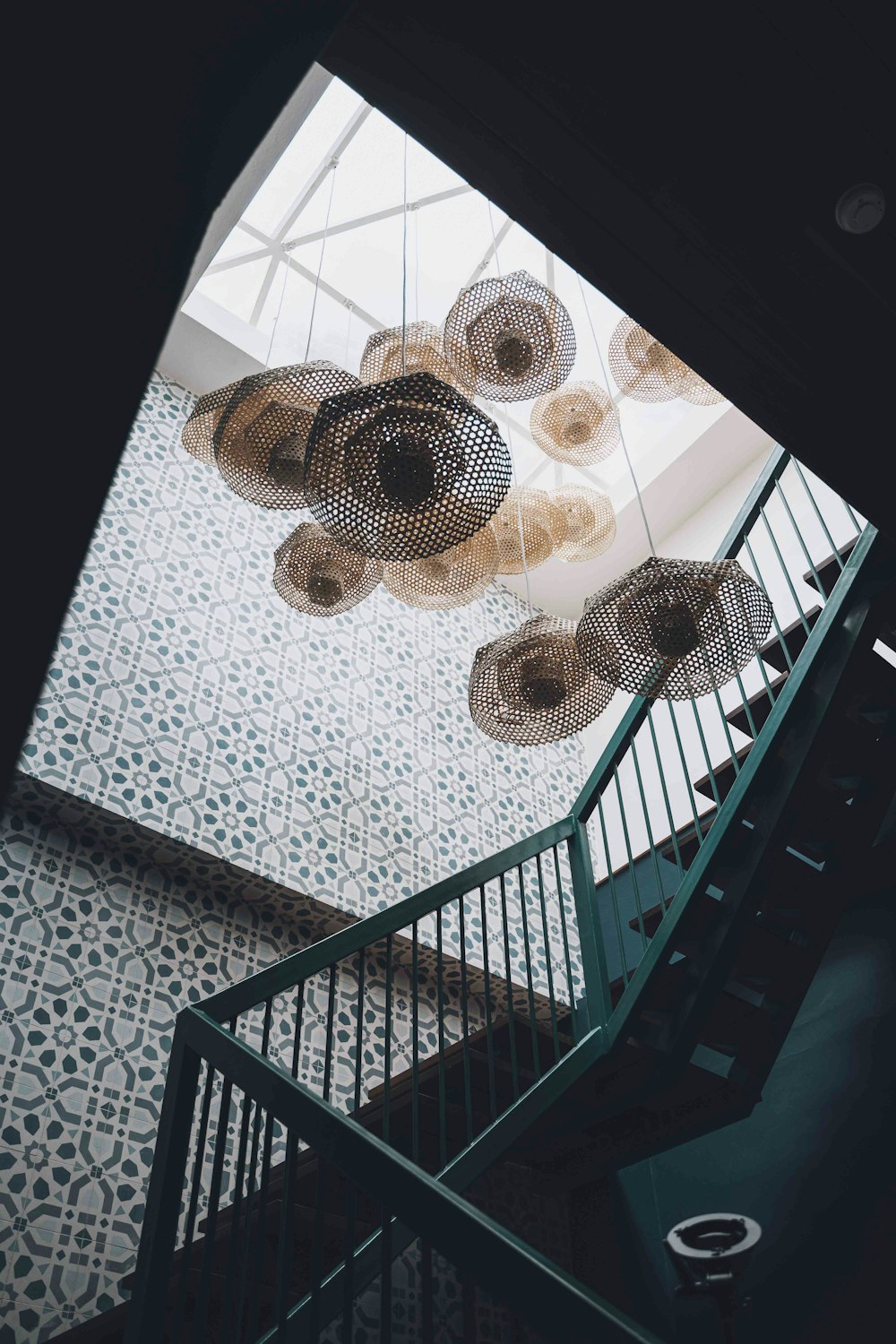 a staircase with a bunch of lights hanging from it