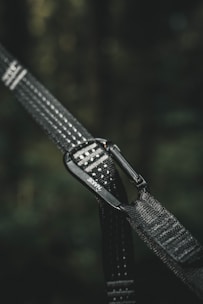 a close up of a black and white strap