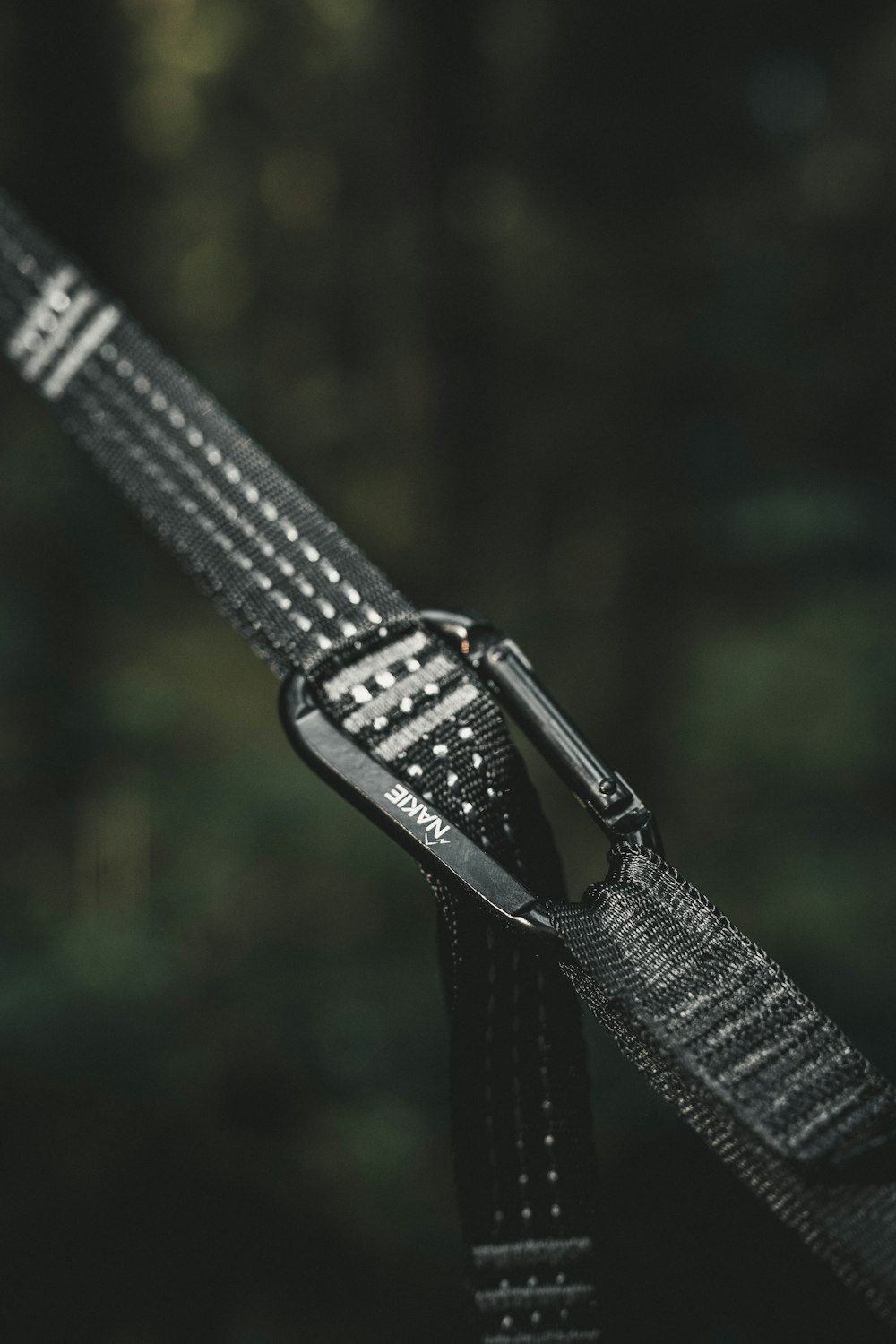 a close up of a black and white strap
