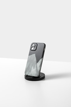 a black and white picture of a cell phone