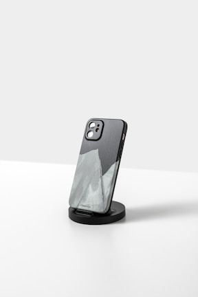 a black and white picture of a cell phone