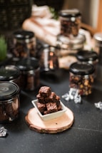 a plate of brownies sitting on top of a table