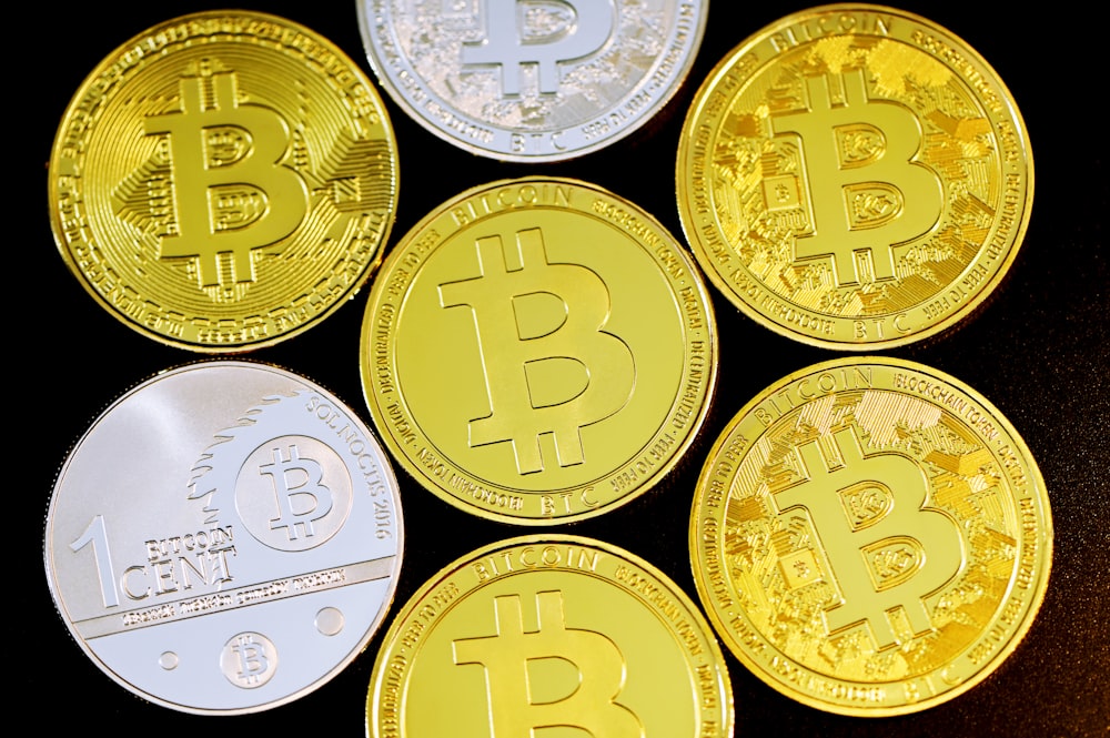 a group of bitcoins sitting on top of each other