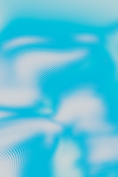 Photo of a digital art piece blending black and white with electric blue accents.