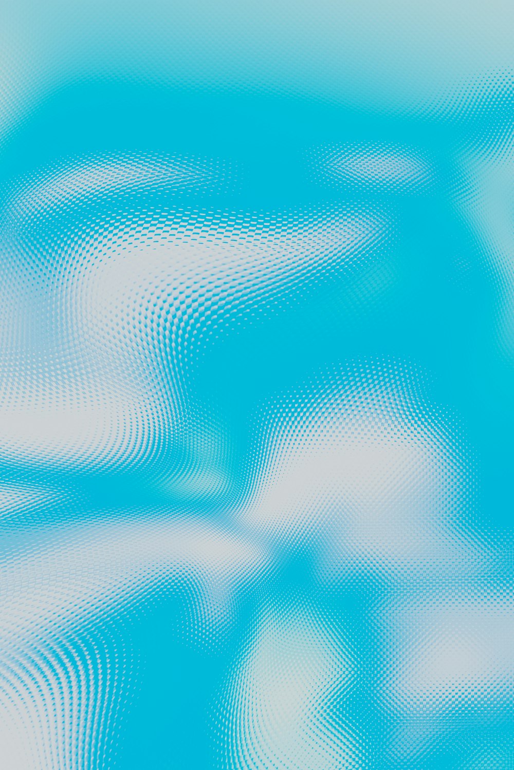 Una imagen borrosa de un cielo azul con nubes blancas