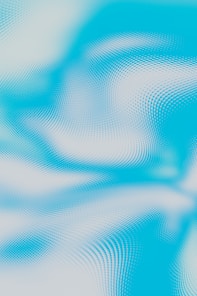 a blue and white background with wavy lines