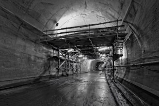 a black and white photo of a tunnel