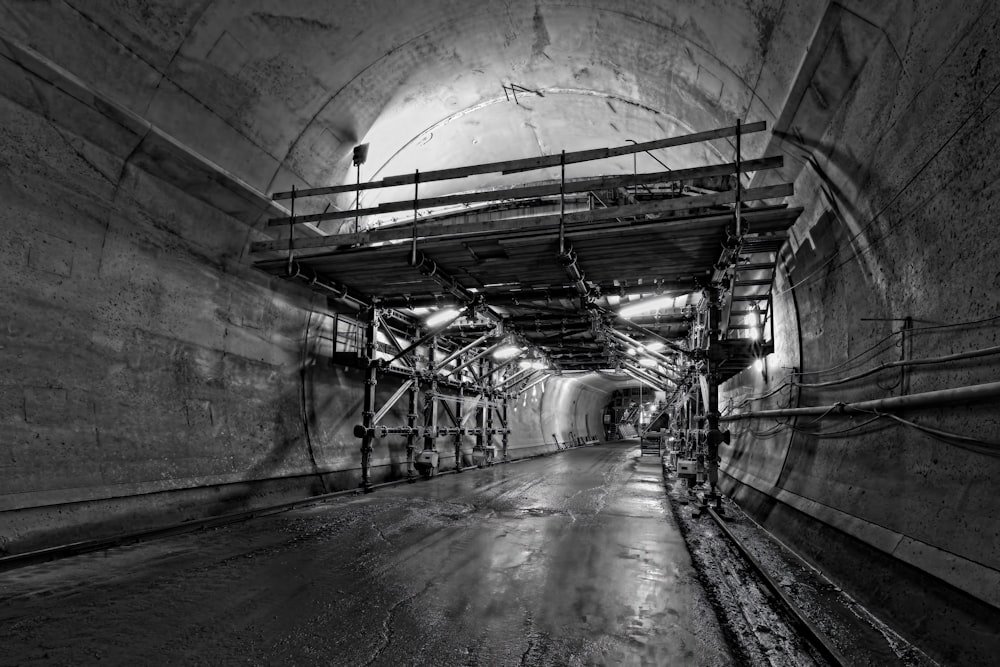 a black and white photo of a tunnel