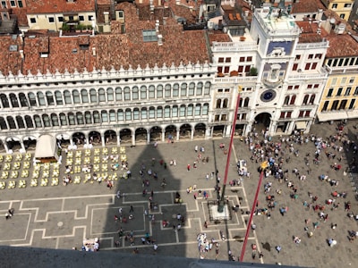 An aerial view of a large gathering in a public square.