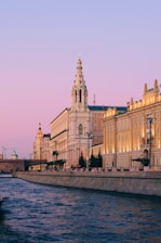 a large building next to the water