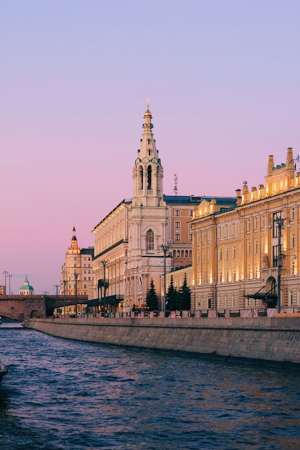 a large building next to the water