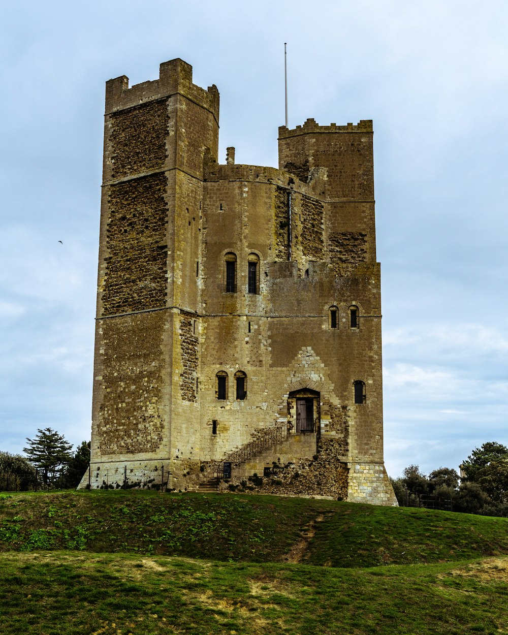 a very tall castle with a steeple on top of it