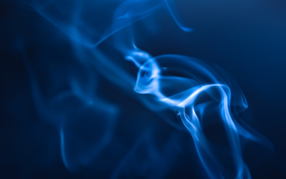 a blue smoke texture on a black background