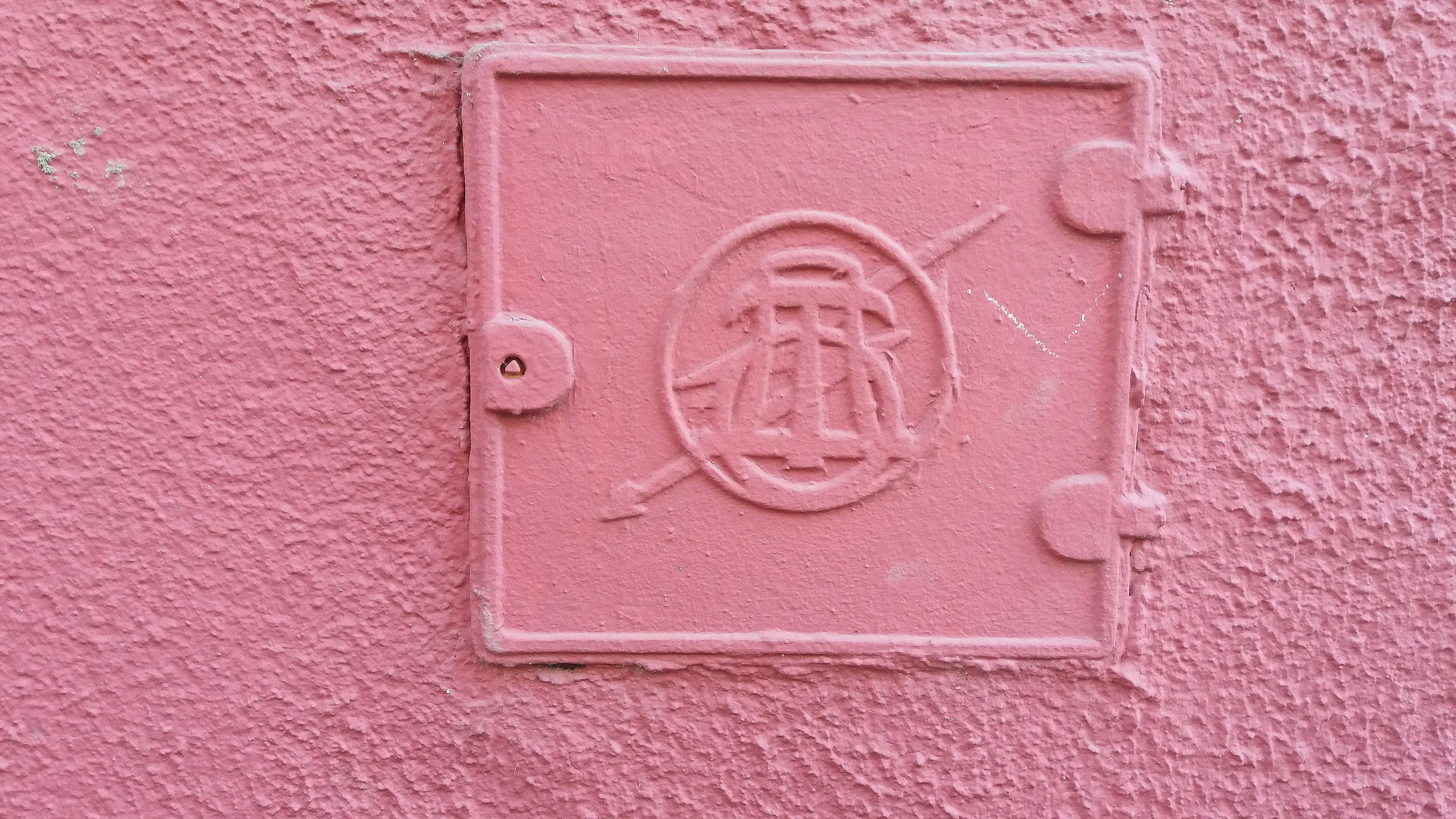Pink wall with picture