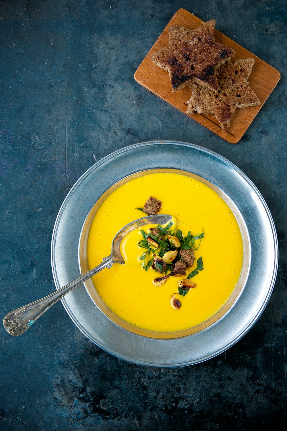 a bowl of soup with a spoon in it