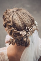 a woman with a wedding hair comb in her hair