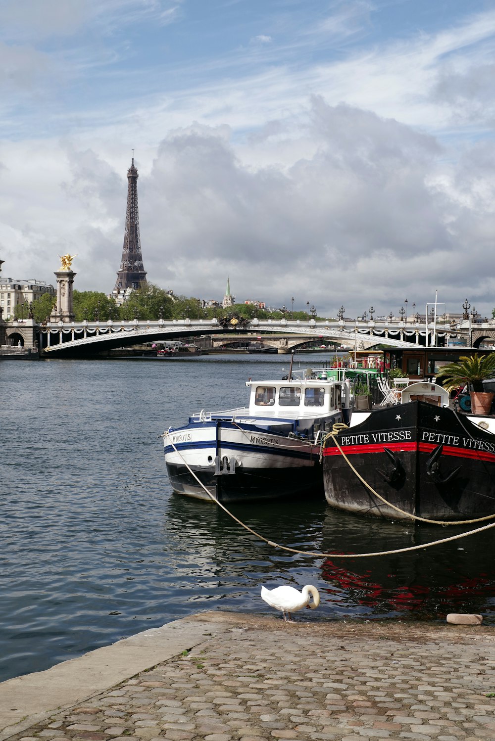 a couple of boats that are sitting in the water