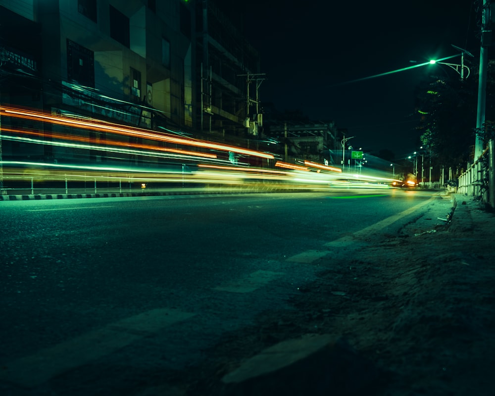 a blurry photo of a city street at night