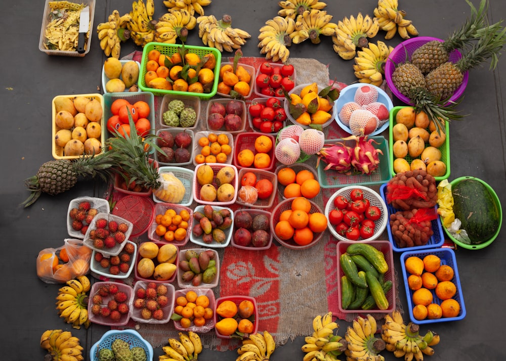 a table topped with lots of fruits and vegetables