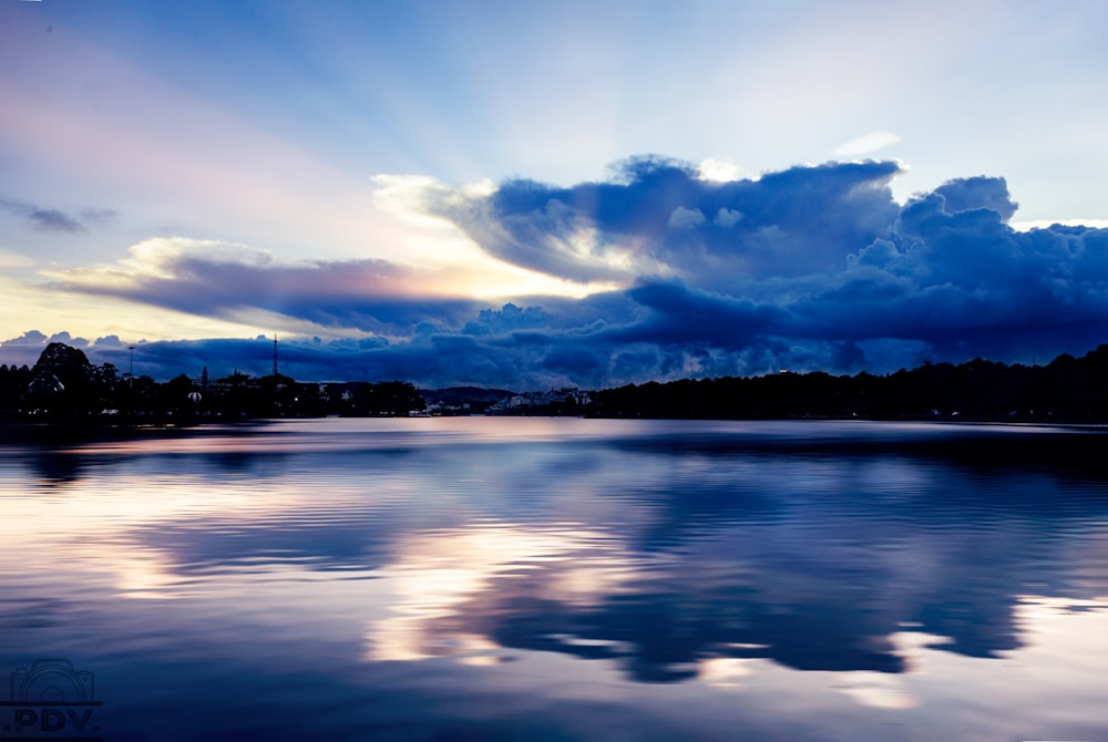 body of water under blue sky during daytime