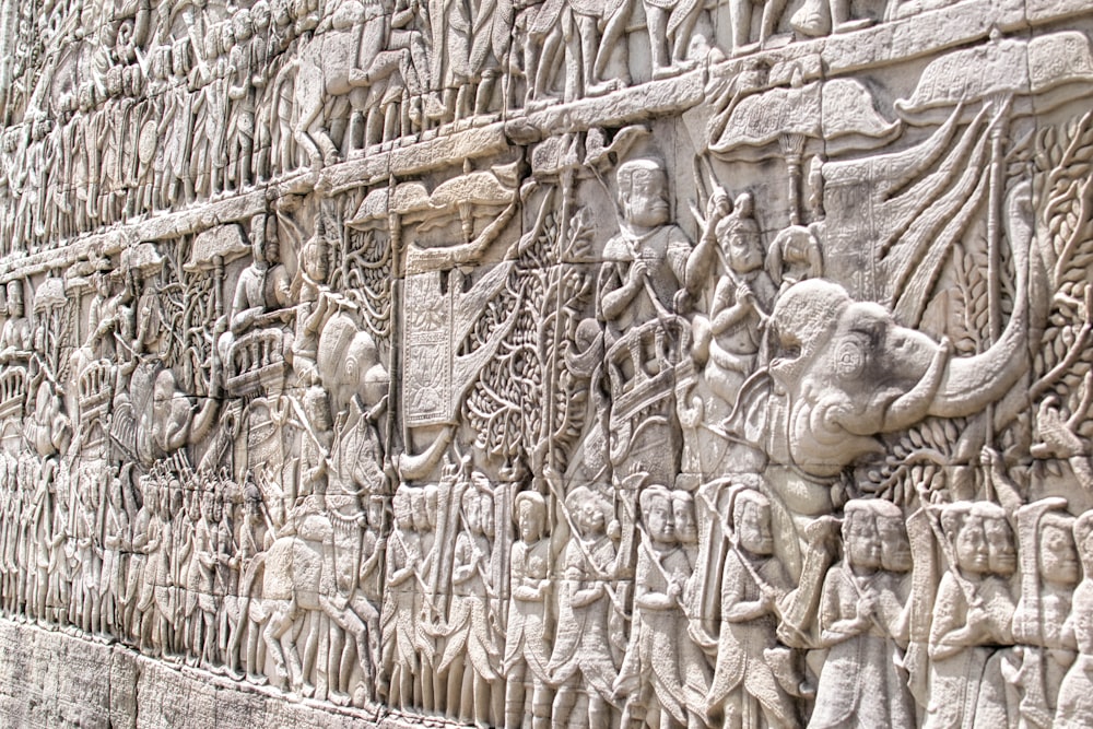 brown concrete wall with human face embossed