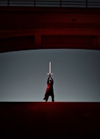 Epic fantasy RPG moment with a hero wielding glowing weapons against shadowy foes.