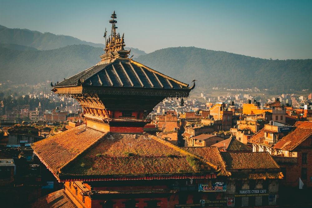 a view of a city with mountains in the background