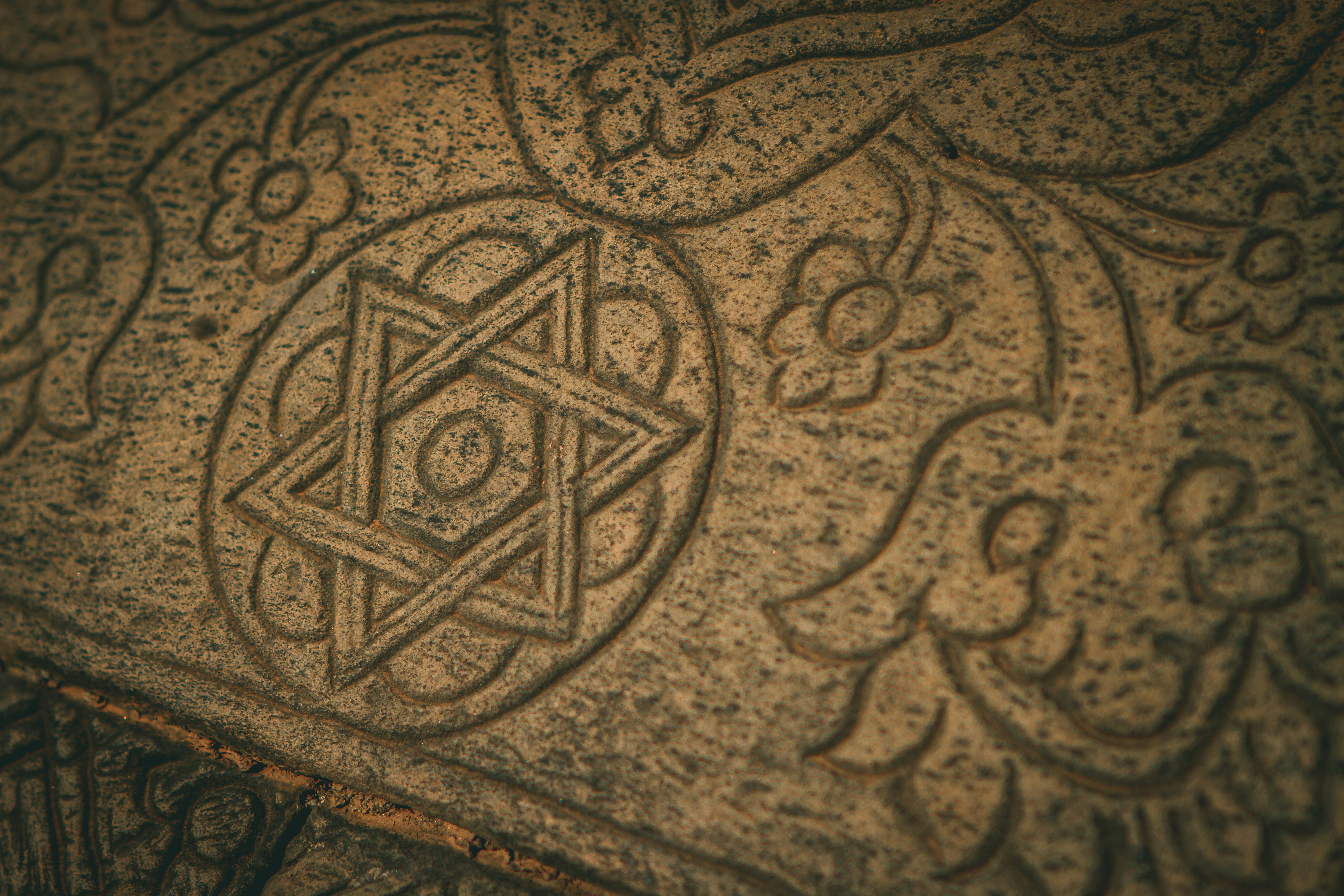 a close up of a stone with a design on it