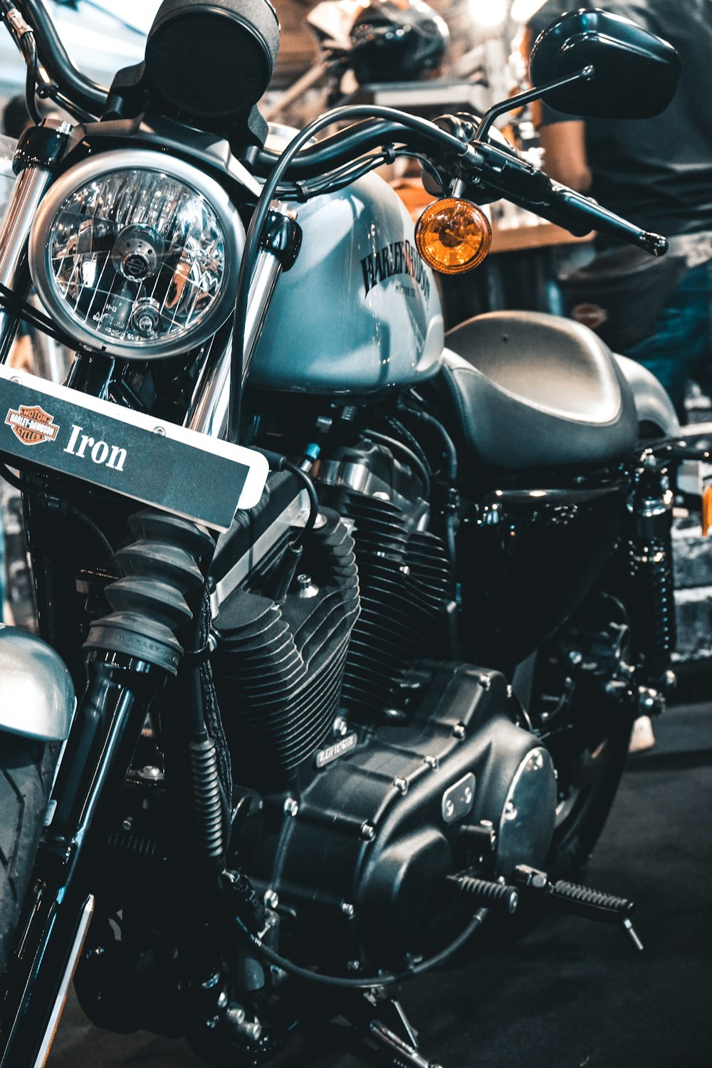 black and silver motorcycle with yellow and black license plate