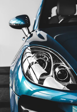 red and black car in close up photography