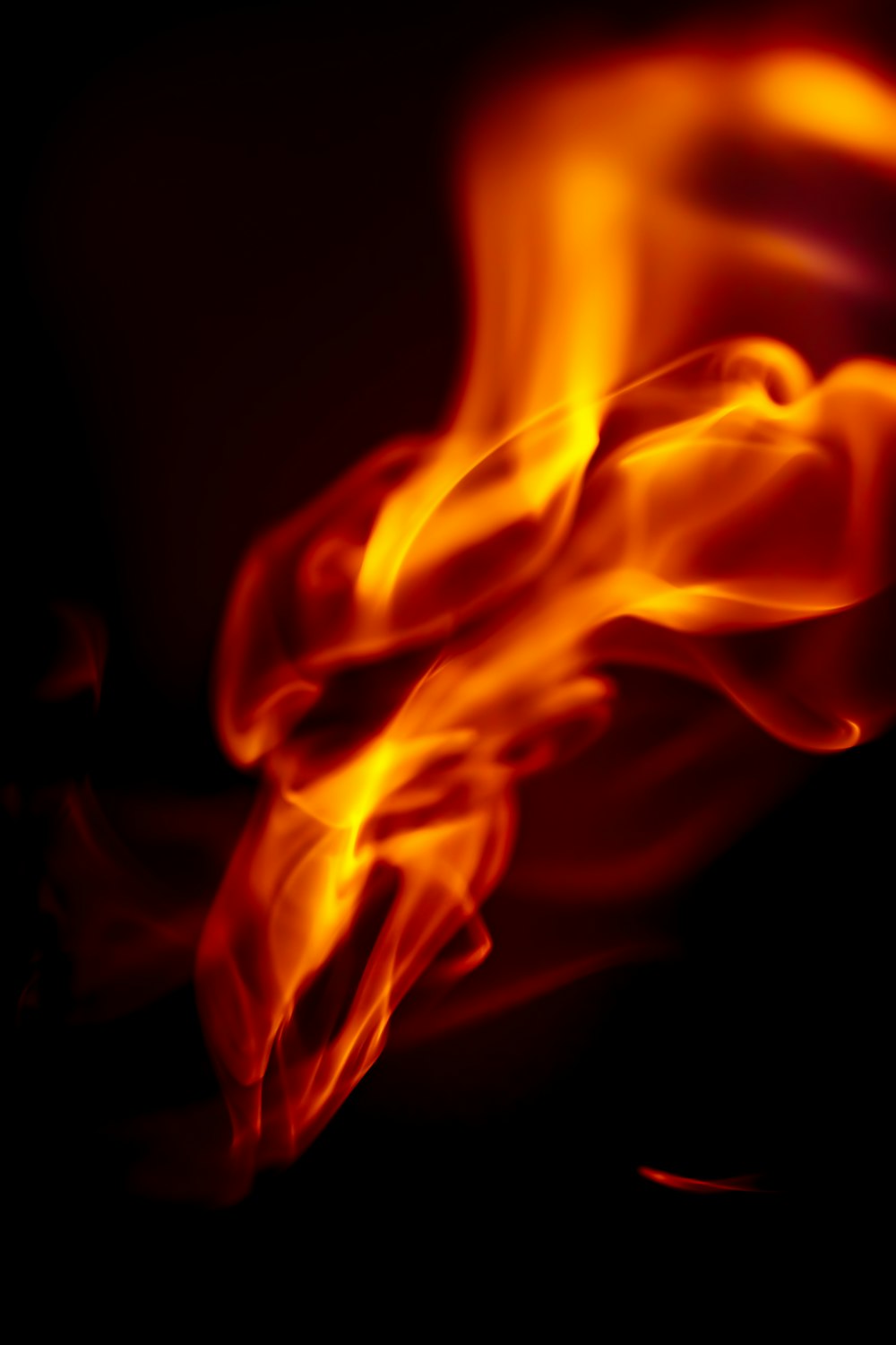 a close up of a fire on a black background