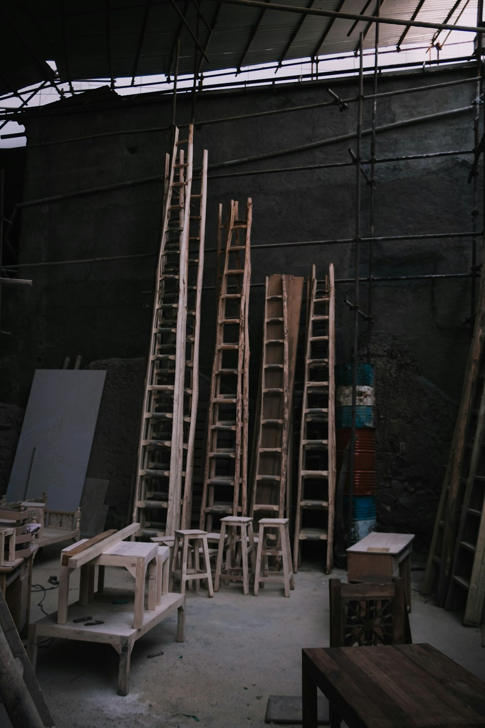 a room filled with lots of wooden shelves