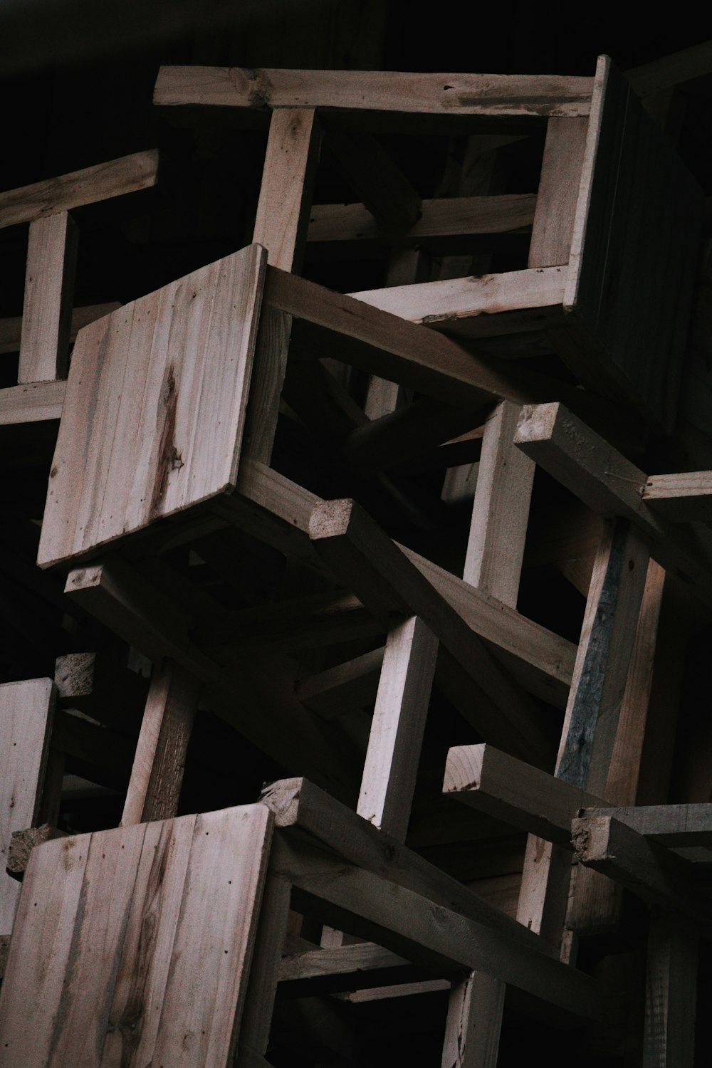 a pile of wooden crates stacked on top of each other