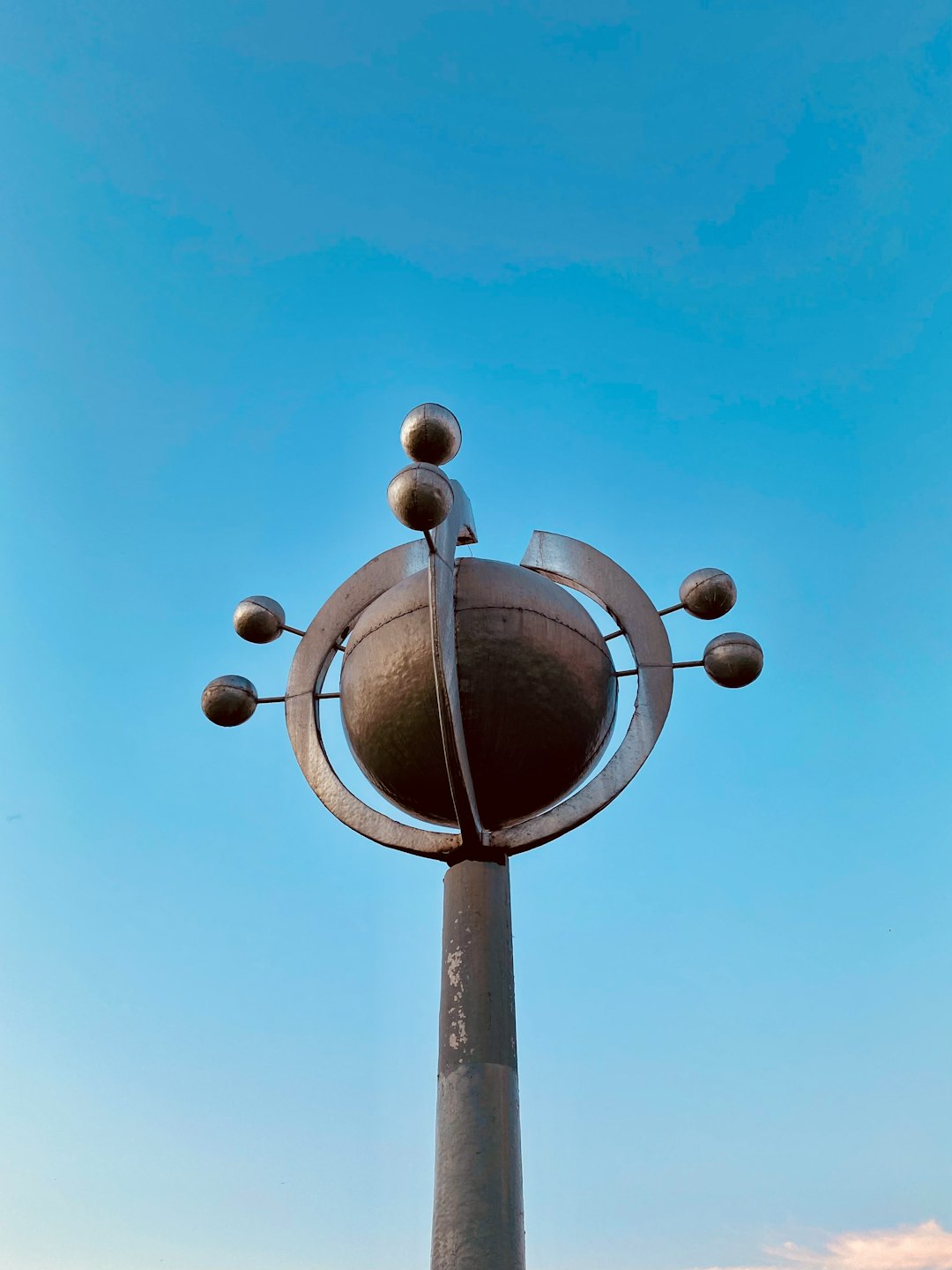 black and brown street lamp under blue sky during daytime