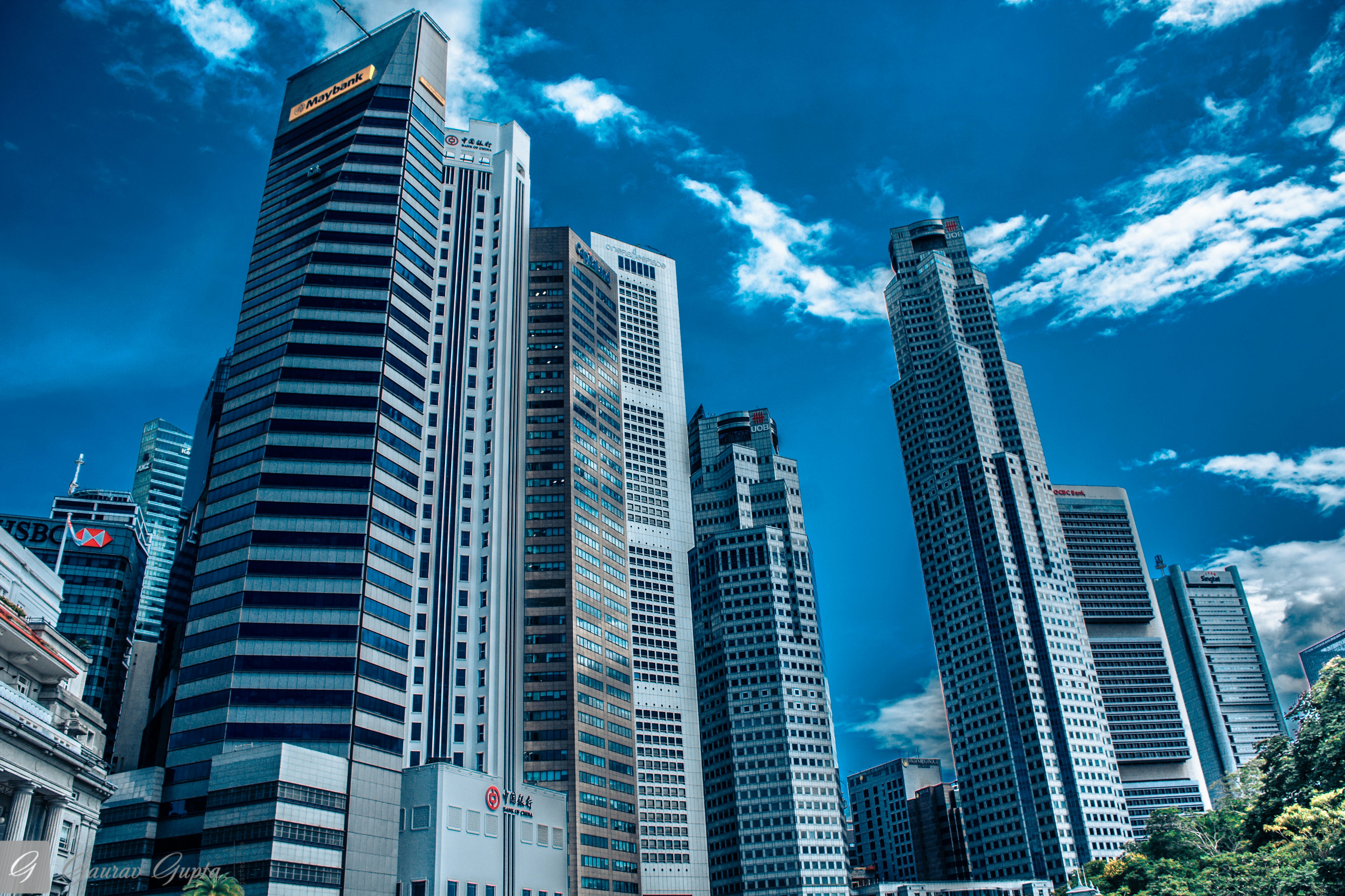 High rise buildings under blue sky during daytime photo – Free Sky  background Image on Unsplash