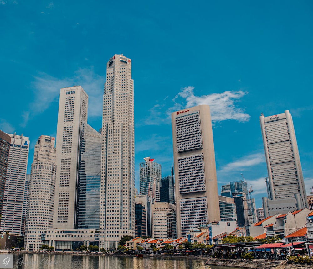 city buildings under blue sky during daytime