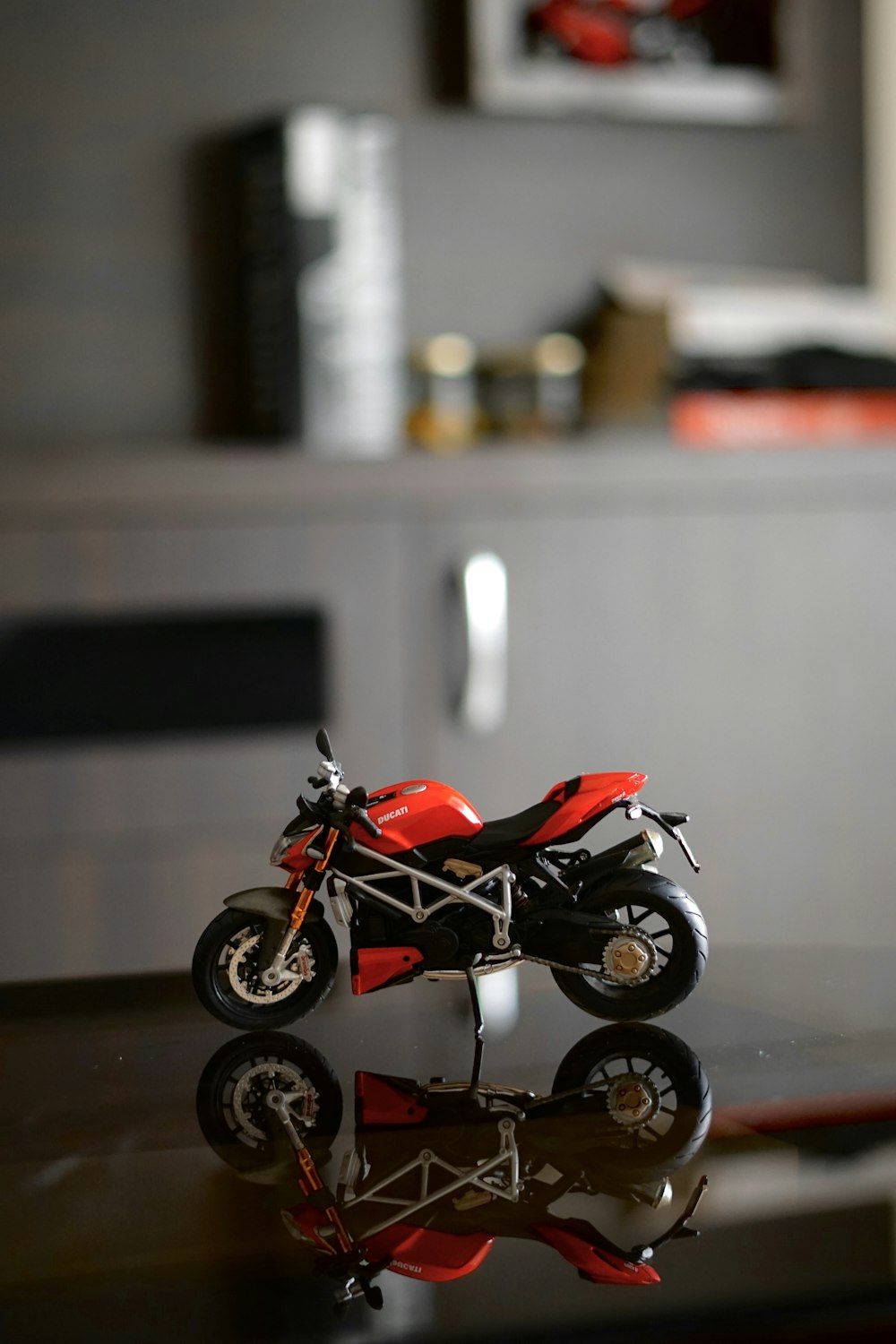 red and black motorcycle scale model