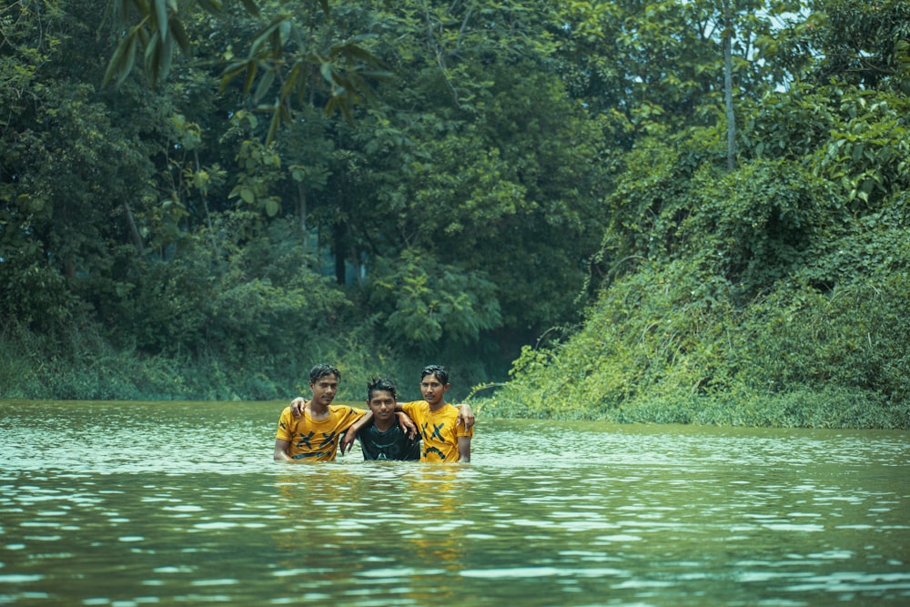 people riding on boat on river during daytime