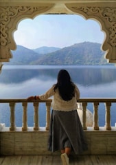 A balcony overlooking the serene lake.