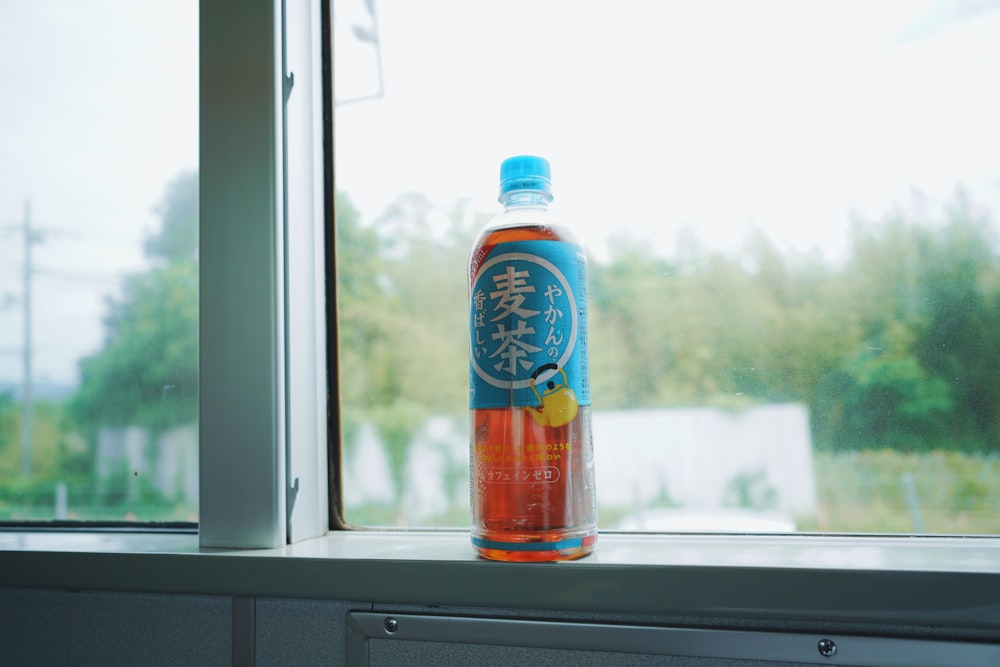 blue and orange labeled bottle