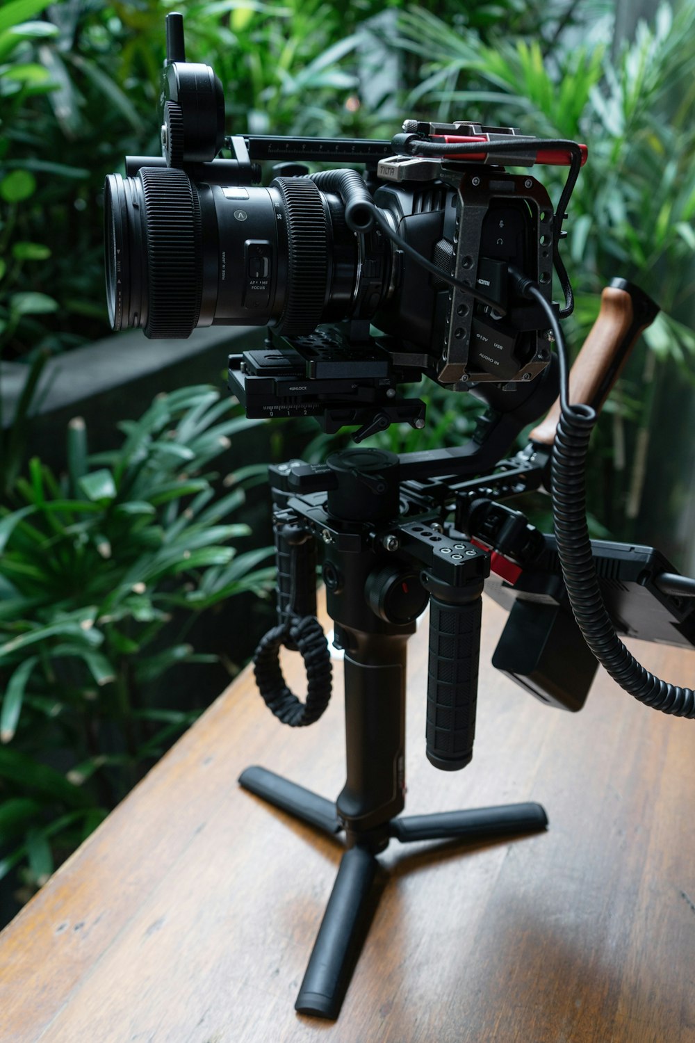 a camera sitting on top of a wooden table