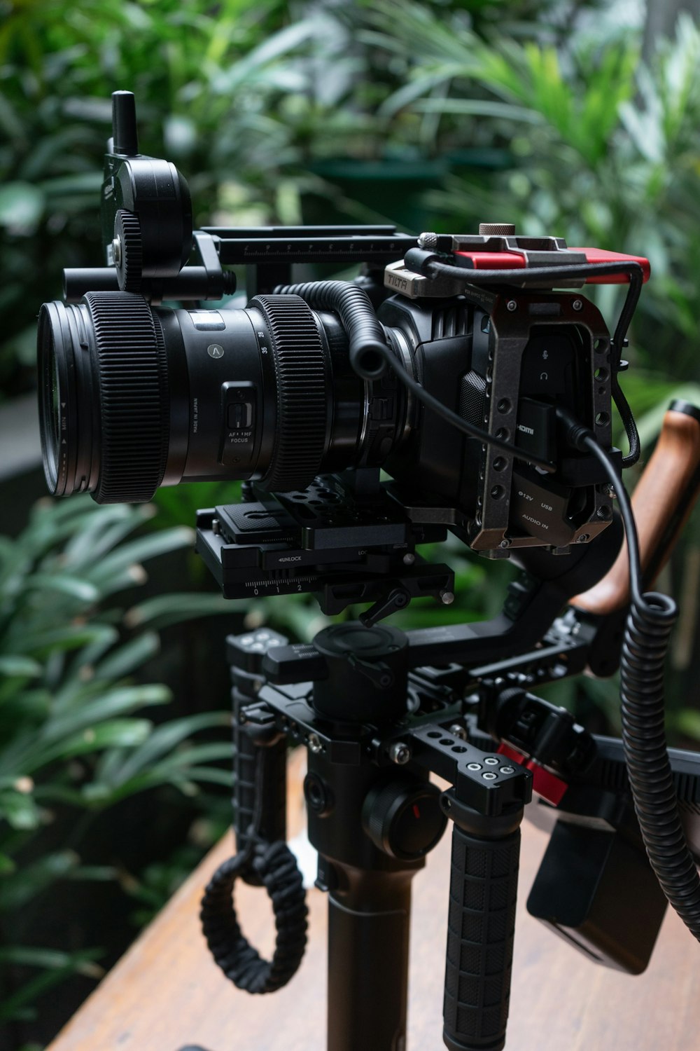 a camera sitting on top of a wooden table