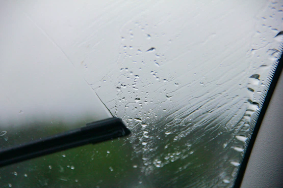 High-quality windshield wipers in action on a rainy car windshield
