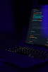 black laptop computer turned on showing blue screen